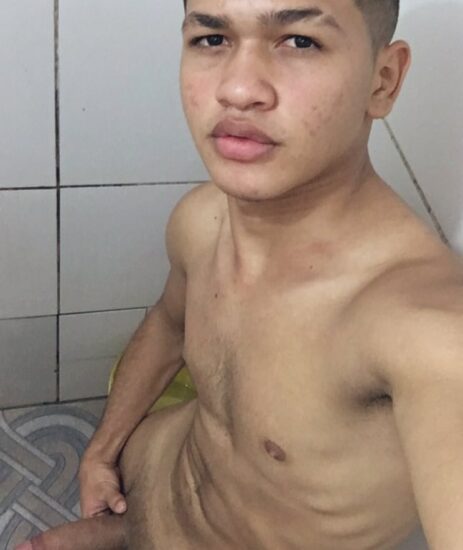 Latino boy taking a nude selfie