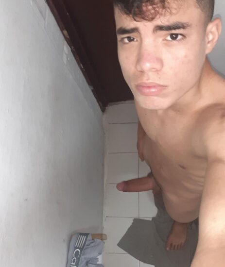 Nude boy taking a selfie