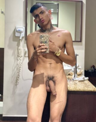 Nude Latino taking a selfie