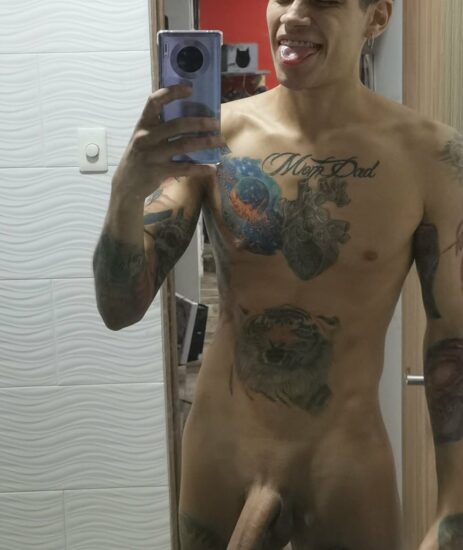 Tattooed boy with a huge dick